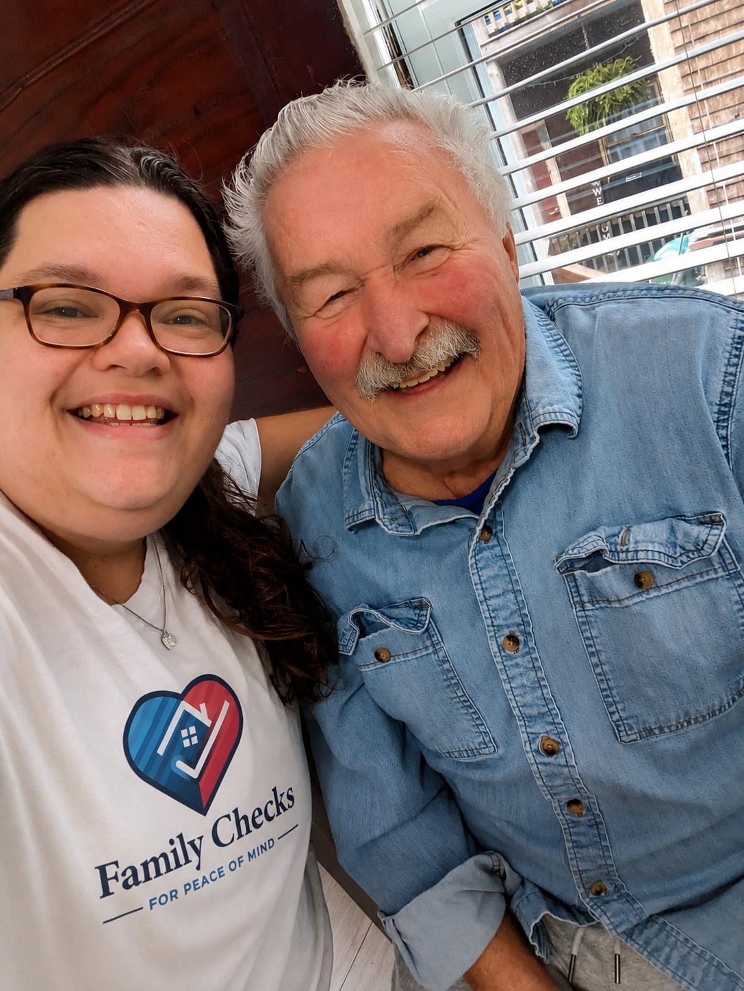 Family Checks caregiver spending time with a client.